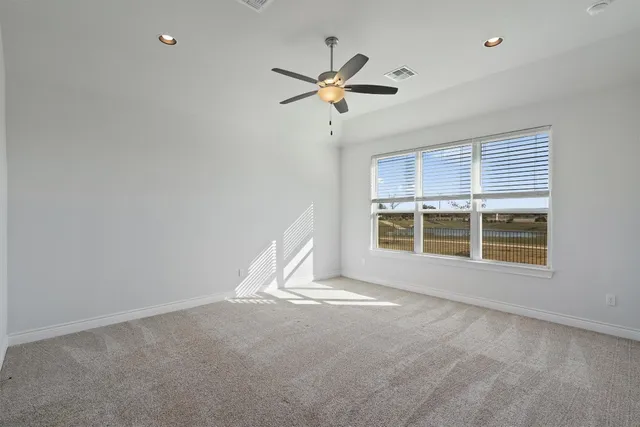 a kitchen with granite countertop cabinets and steel stainless steel appliances