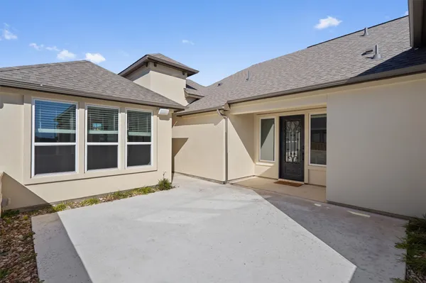 a view of a house with a garage