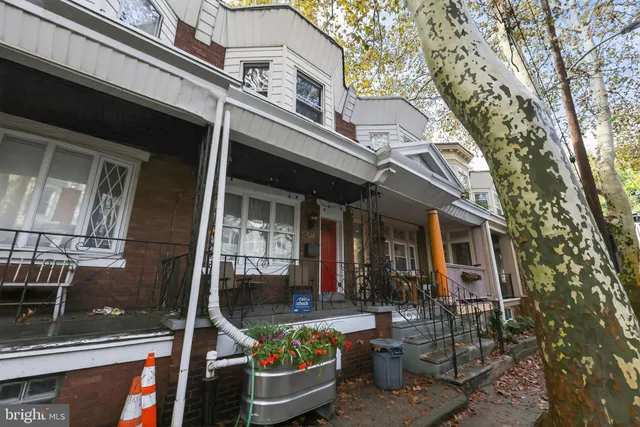 a view of a building with sitting area