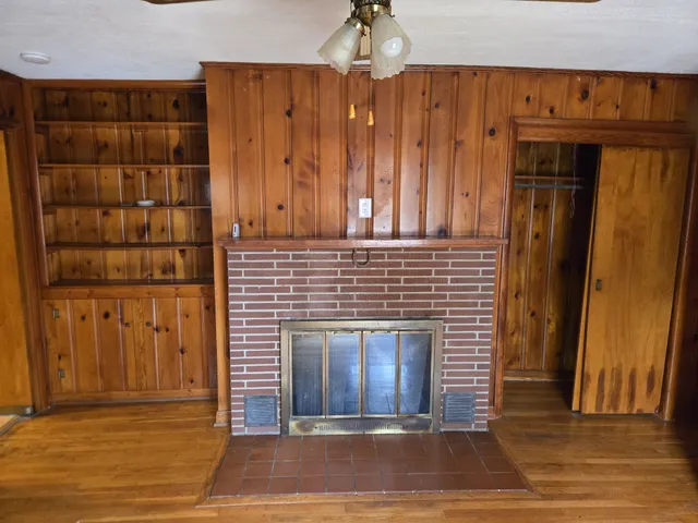 a kitchen with stainless steel appliances a refrigerator sink and cabinets