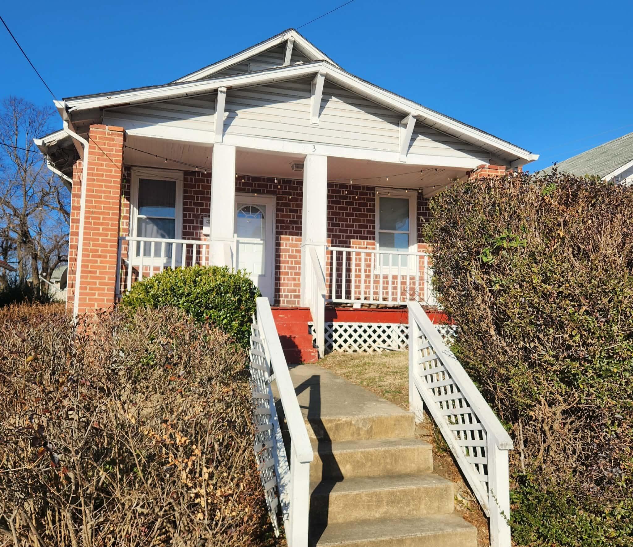 3 14th Street Southwest Roanoke, VA 24016 - Photo 2 of 3 front view of a house with a yard