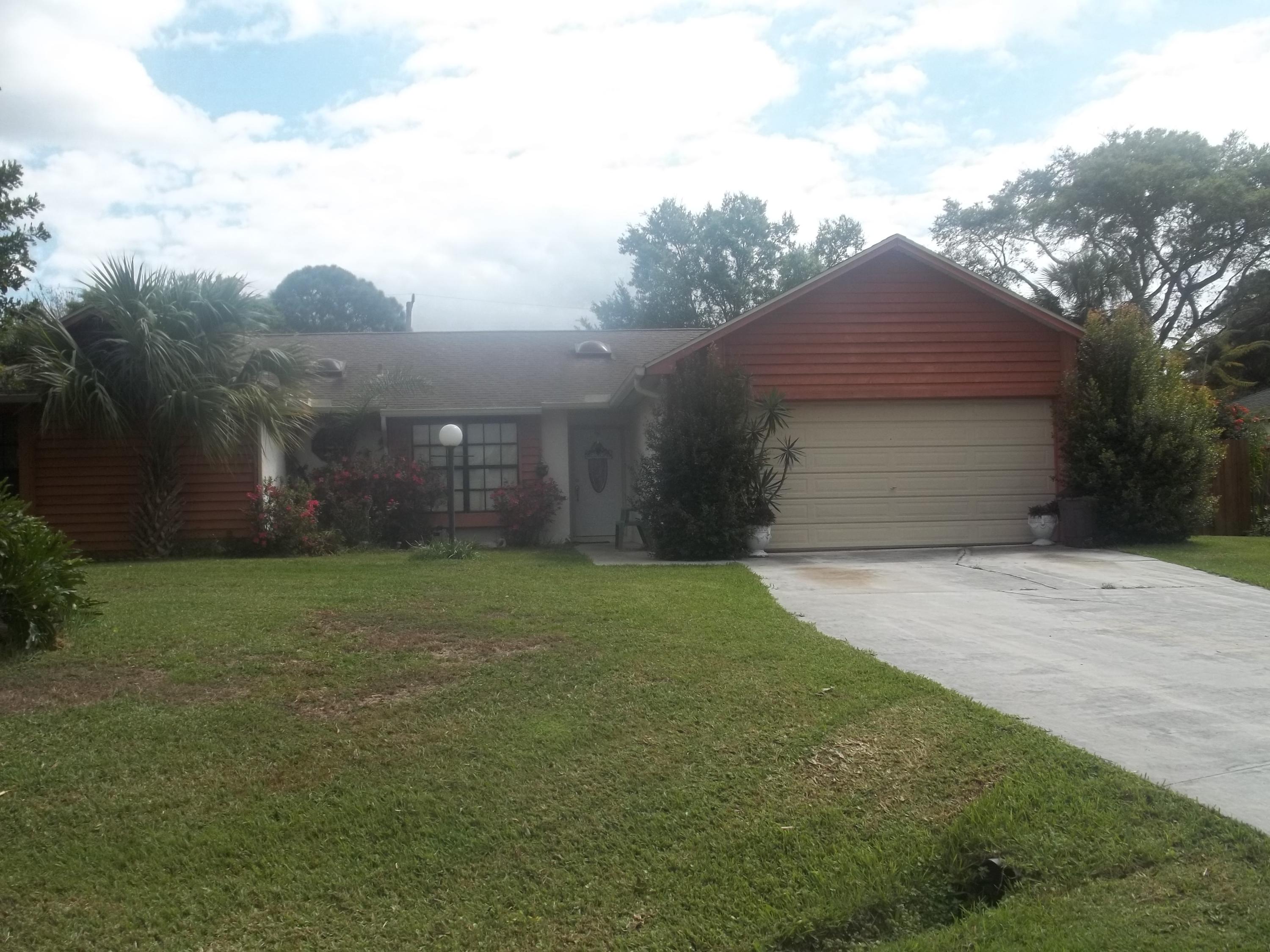 2201 Southwest Cree Road Port St. Lucie, FL 34953 - Photo 1 of 5 Front