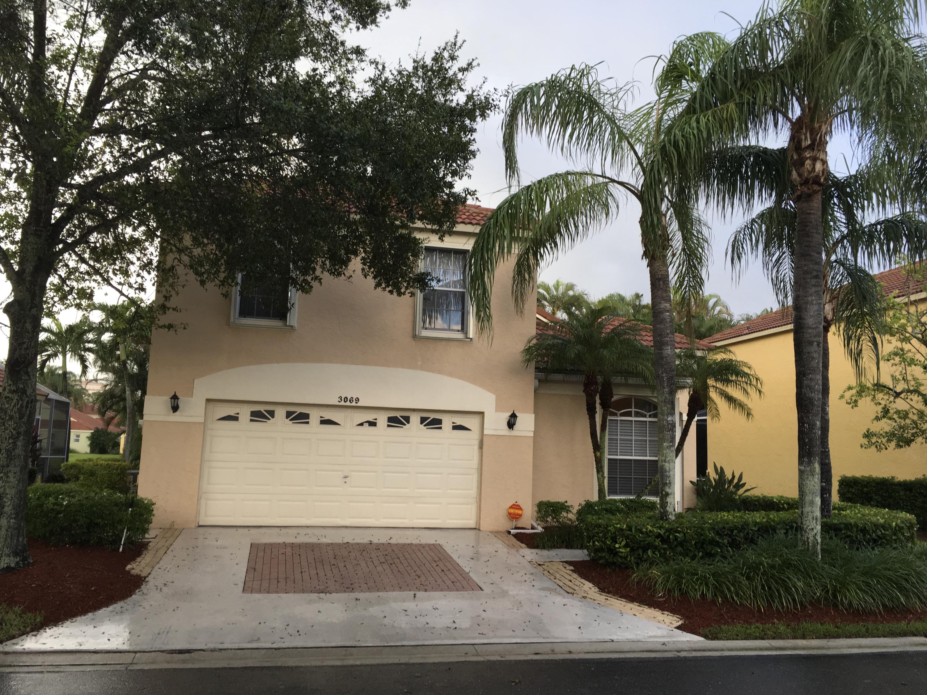 3069 Casa Rio Court Riviera Beach, FL 33418 - Photo 2 of 26 Front View