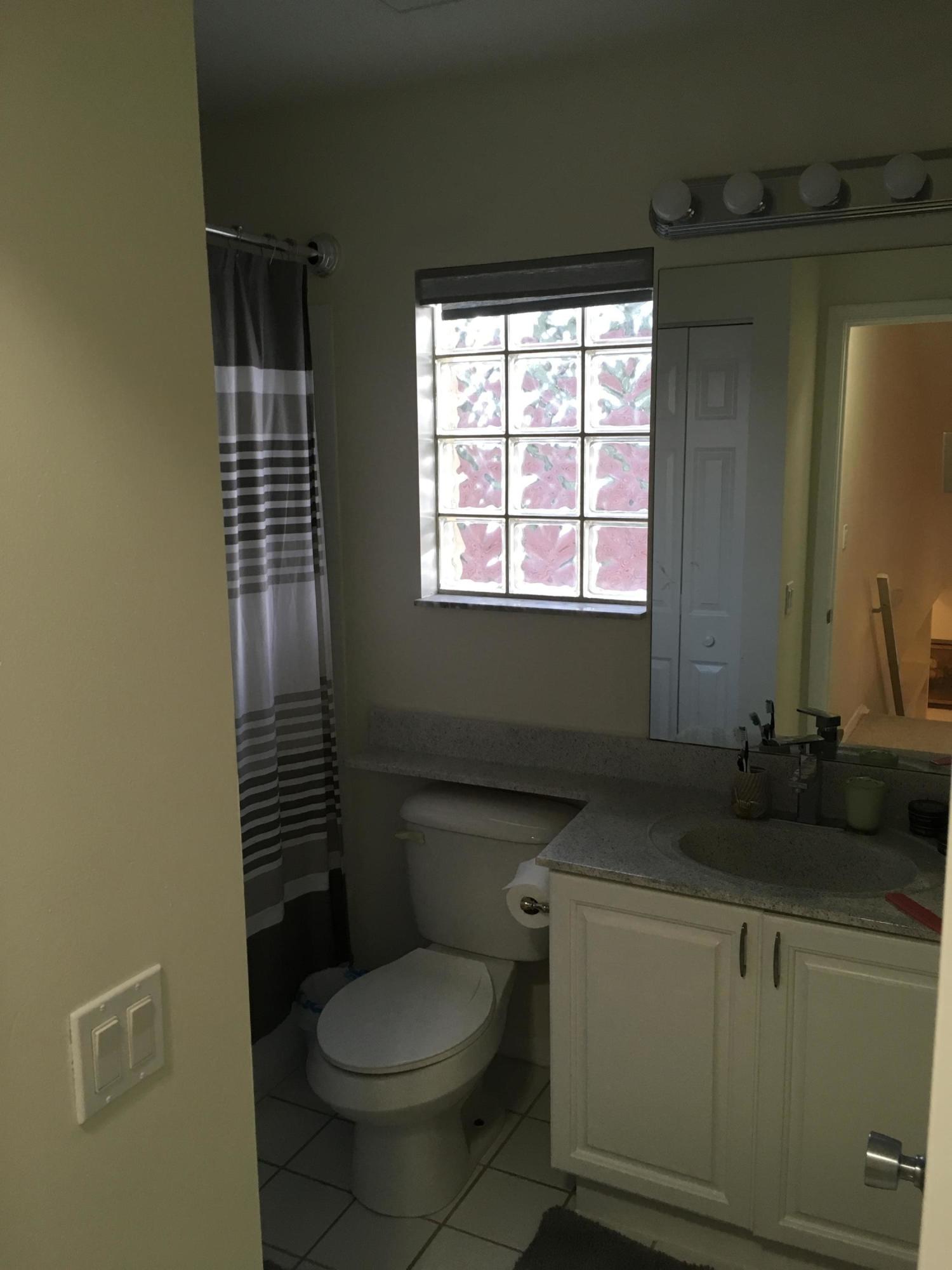 3069 Casa Rio Court Riviera Beach, FL 33418 - Photo 22 of 26 Second Floor Bath