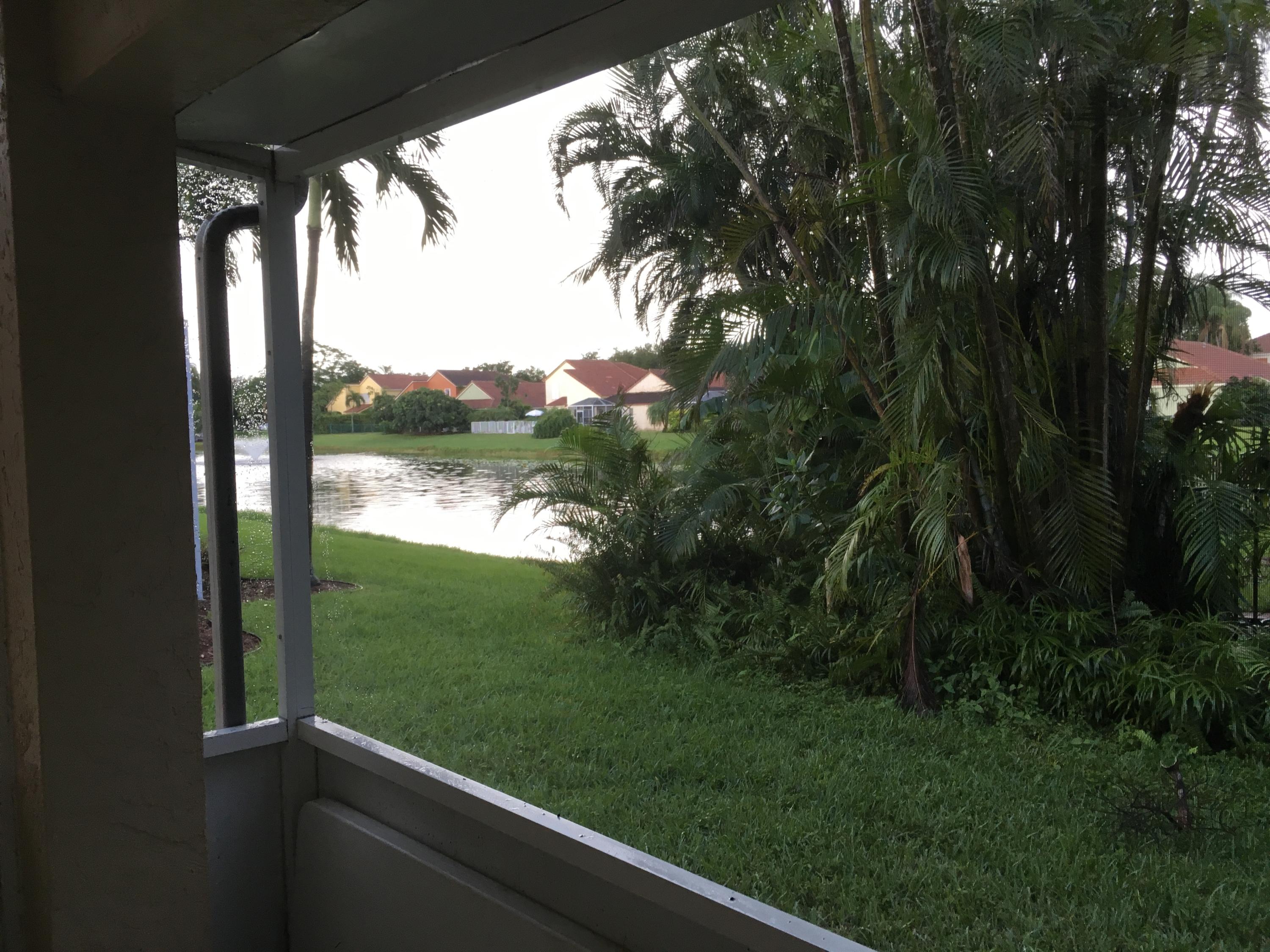 3069 Casa Rio Court Riviera Beach, FL 33418 - Photo 24 of 26 View Screened In Porch