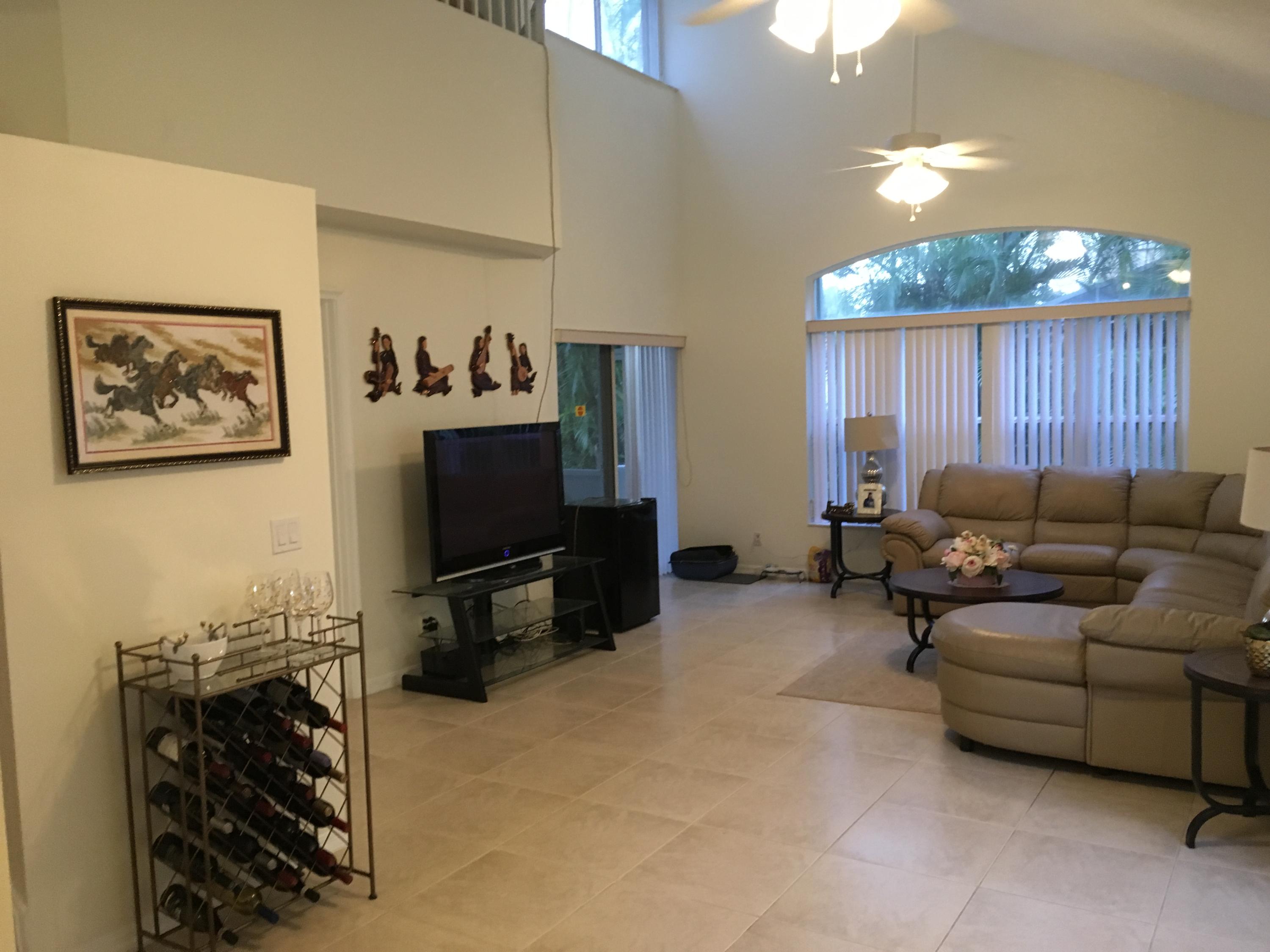 3069 Casa Rio Court Riviera Beach, FL 33418 - Photo 7 of 26 Living Room Vaulted Ceilings