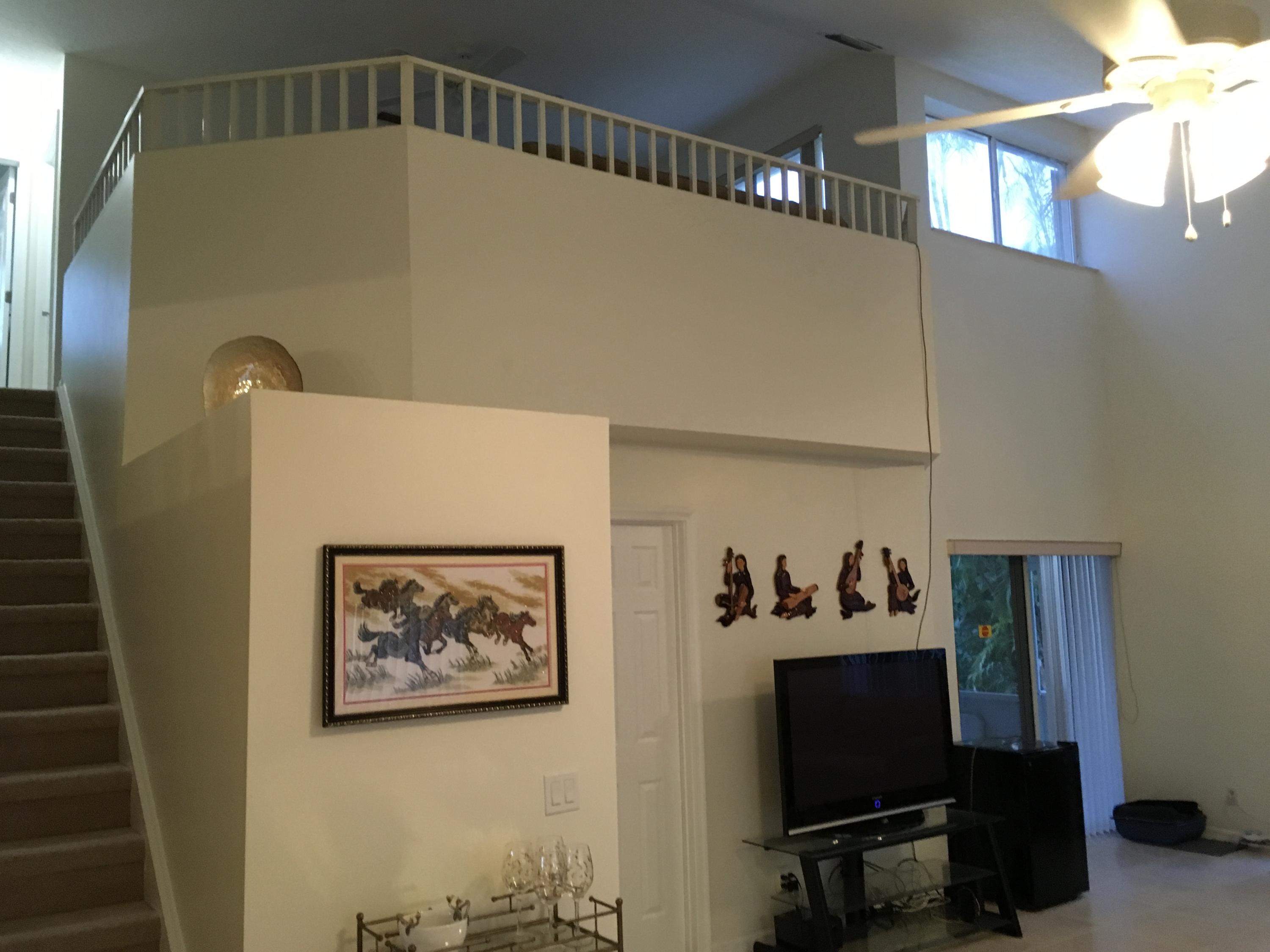3069 Casa Rio Court Riviera Beach, FL 33418 - Photo 8 of 26 Living Room Looking Up at Loft