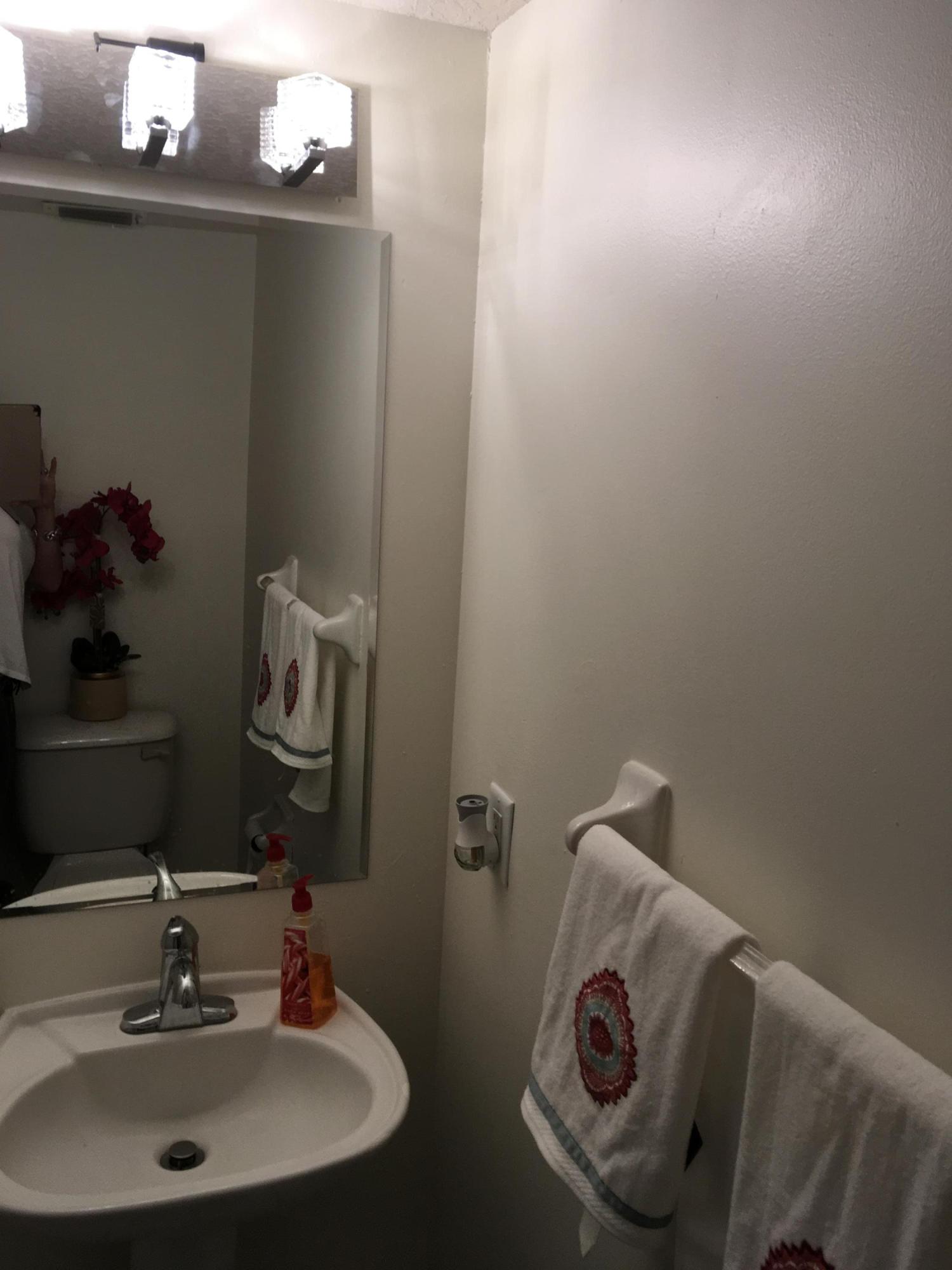 3069 Casa Rio Court Riviera Beach, FL 33418 - Photo 10 of 26 Half Bath First Floor