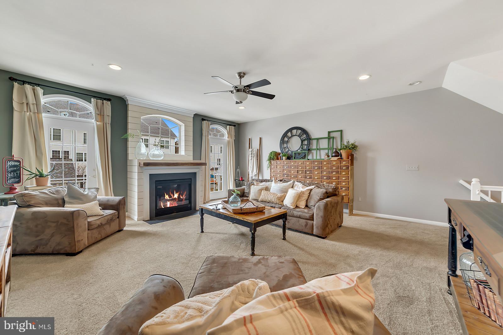 42427 Rockslide Terrace Brambleton, VA 20148 - Photo 17 of 54 Grand Living Room with Fireplace