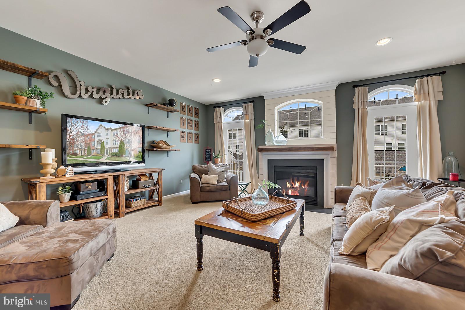 42427 Rockslide Terrace Brambleton, VA 20148 - Photo 18 of 54 Grand Living Room with Access to Rear Valcony