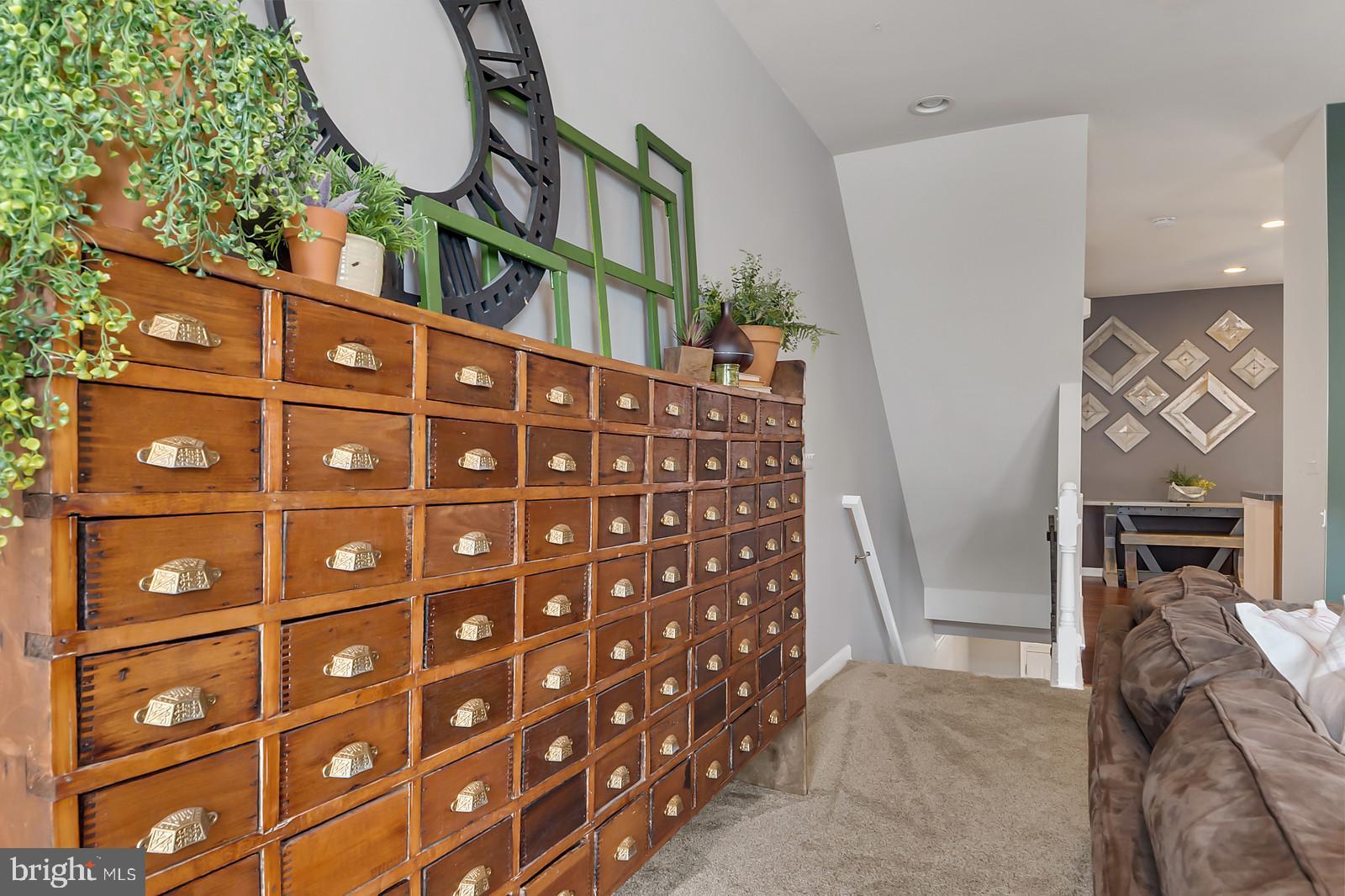 42427 Rockslide Terrace Brambleton, VA 20148 - Photo 21 of 54 Grand Living Room Entrance from Lower Level
