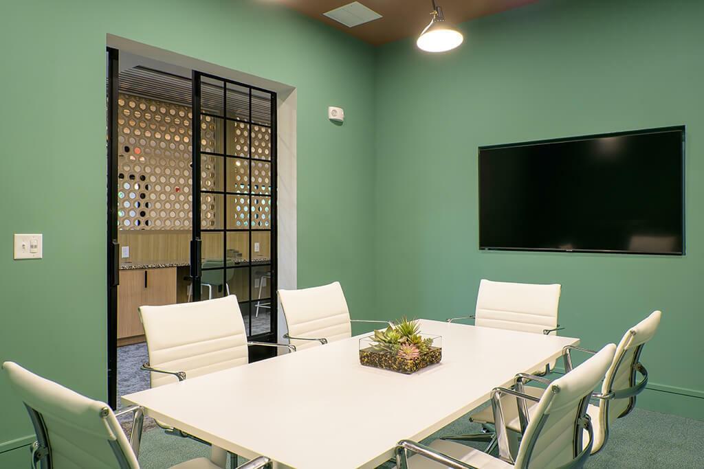 125 Milton Avenue Southeast, Unit S1 Atlanta, GA 30315 - Photo 11 of 41 a balcony with table and chairs