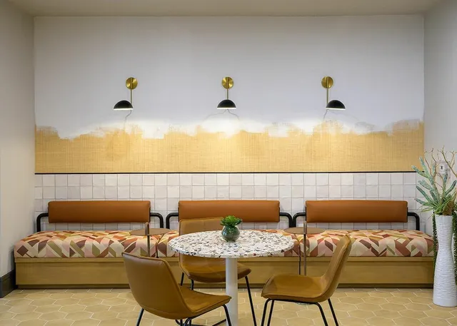 a living room with furniture and a couch