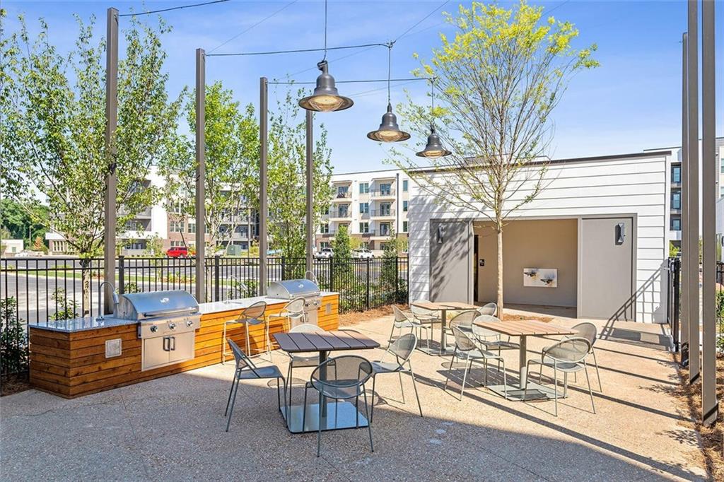 125 Milton Avenue Southeast, Unit S1 Atlanta, GA 30315 - Photo 21 of 41 a outdoor seating area with furniture and garden view