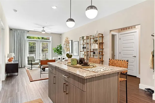 a view of living room with granite countertop furniture and fireplace