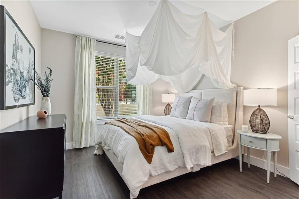 125 Milton Avenue Southeast, Unit S1 Atlanta, GA 30315 - Photo 28 of 41 a bedroom with a bed and window