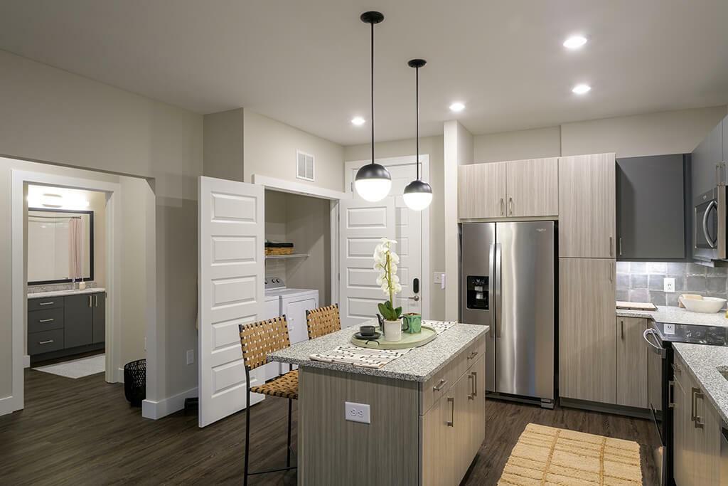 125 Milton Avenue Southeast, Unit S1 Atlanta, GA 30315 - Photo 35 of 41 a kitchen with a refrigerator a sink and a stove