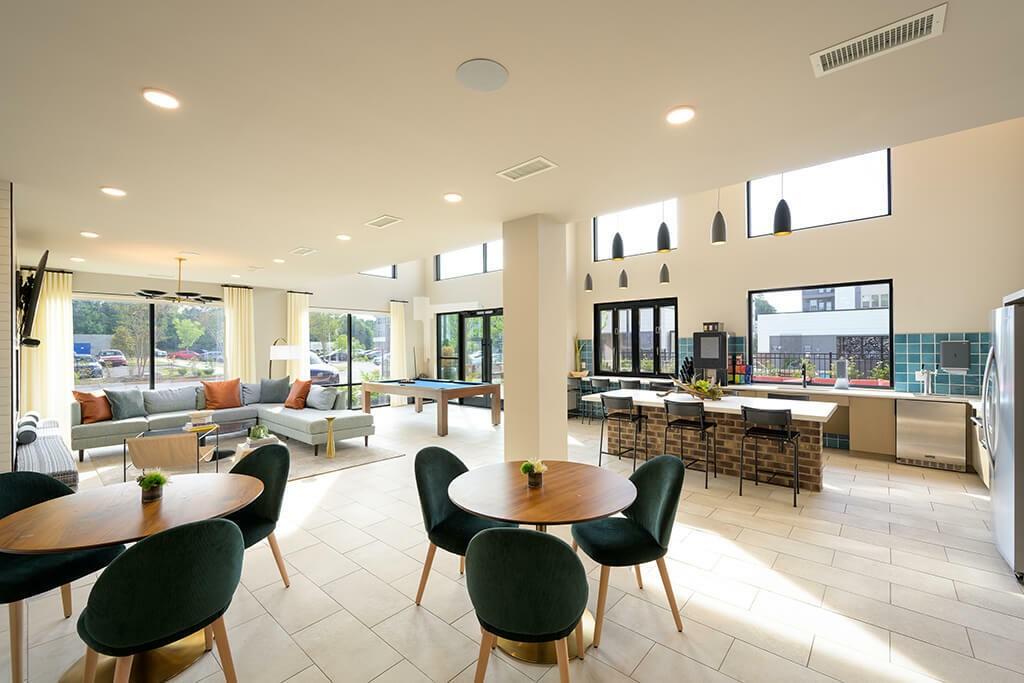 125 Milton Avenue Southeast, Unit S1 Atlanta, GA 30315 - Photo 7 of 41 a living room with fireplace furniture and a large window