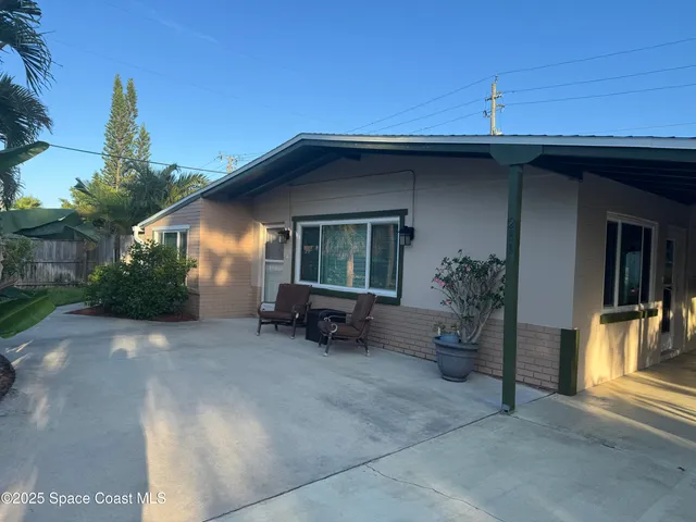 a view of a house with a patio
