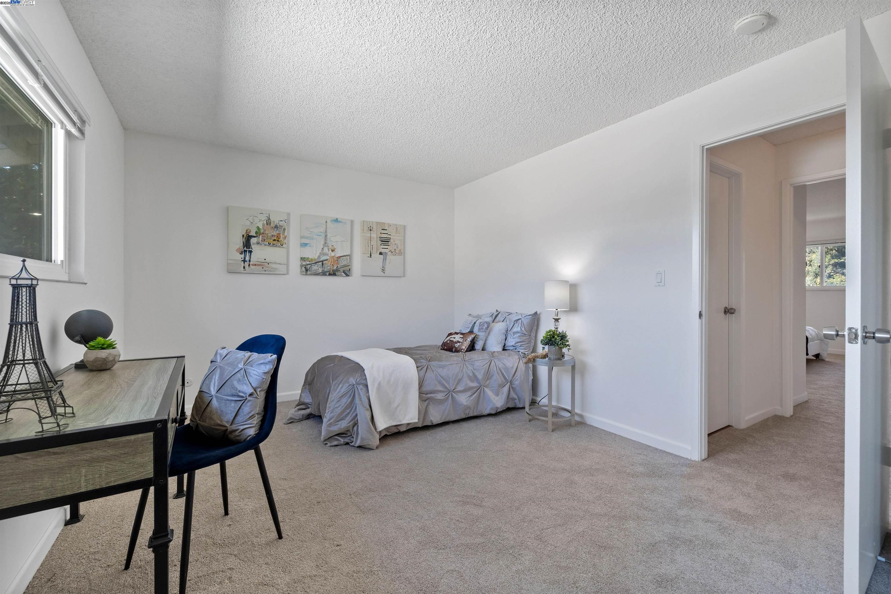 21053 Baker Road Castro Valley, CA 94546 - Photo 14 of 22 a living room with furniture and a table