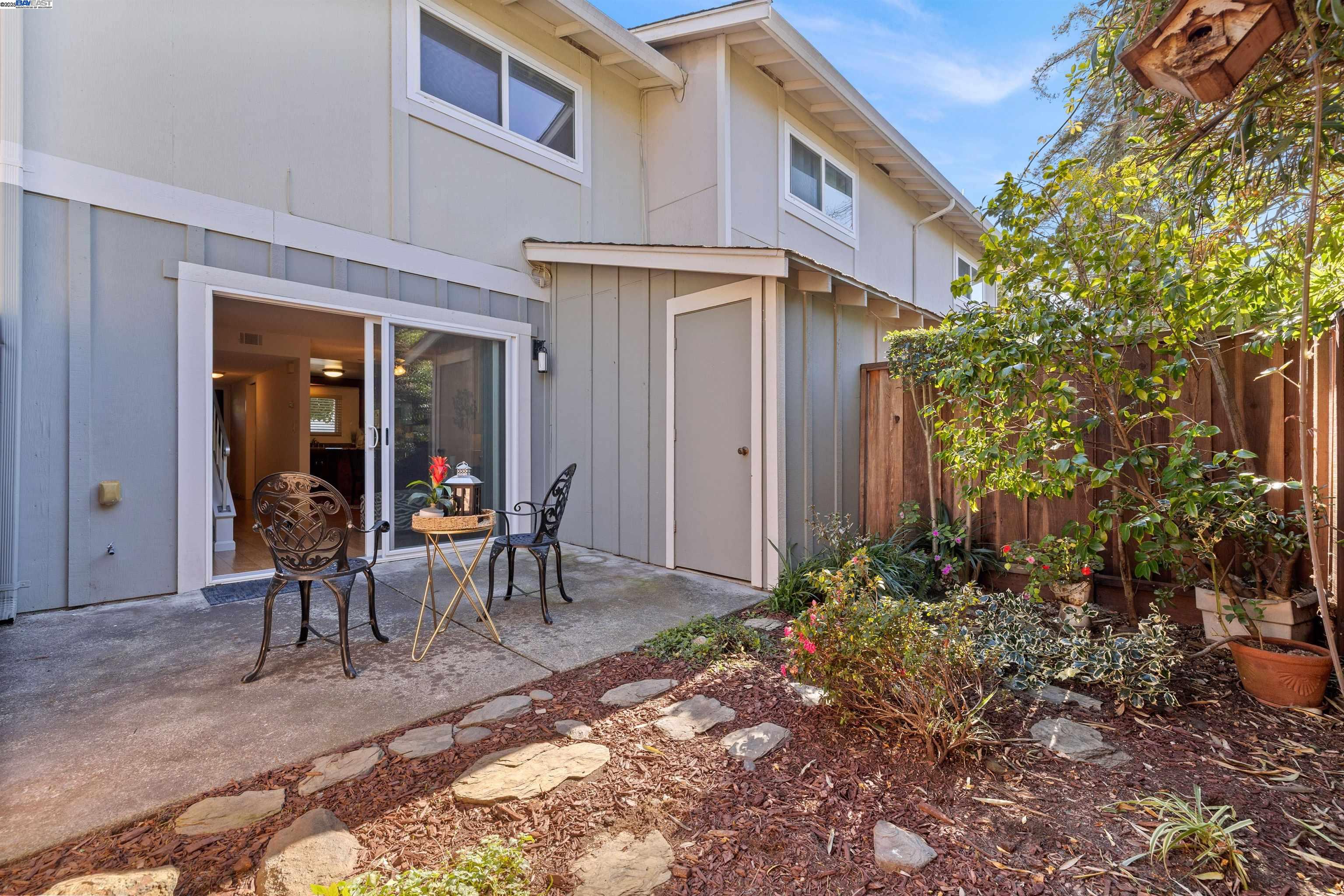 21053 Baker Road Castro Valley, CA 94546 - Photo 18 of 22 a view of two chairs in a backyard