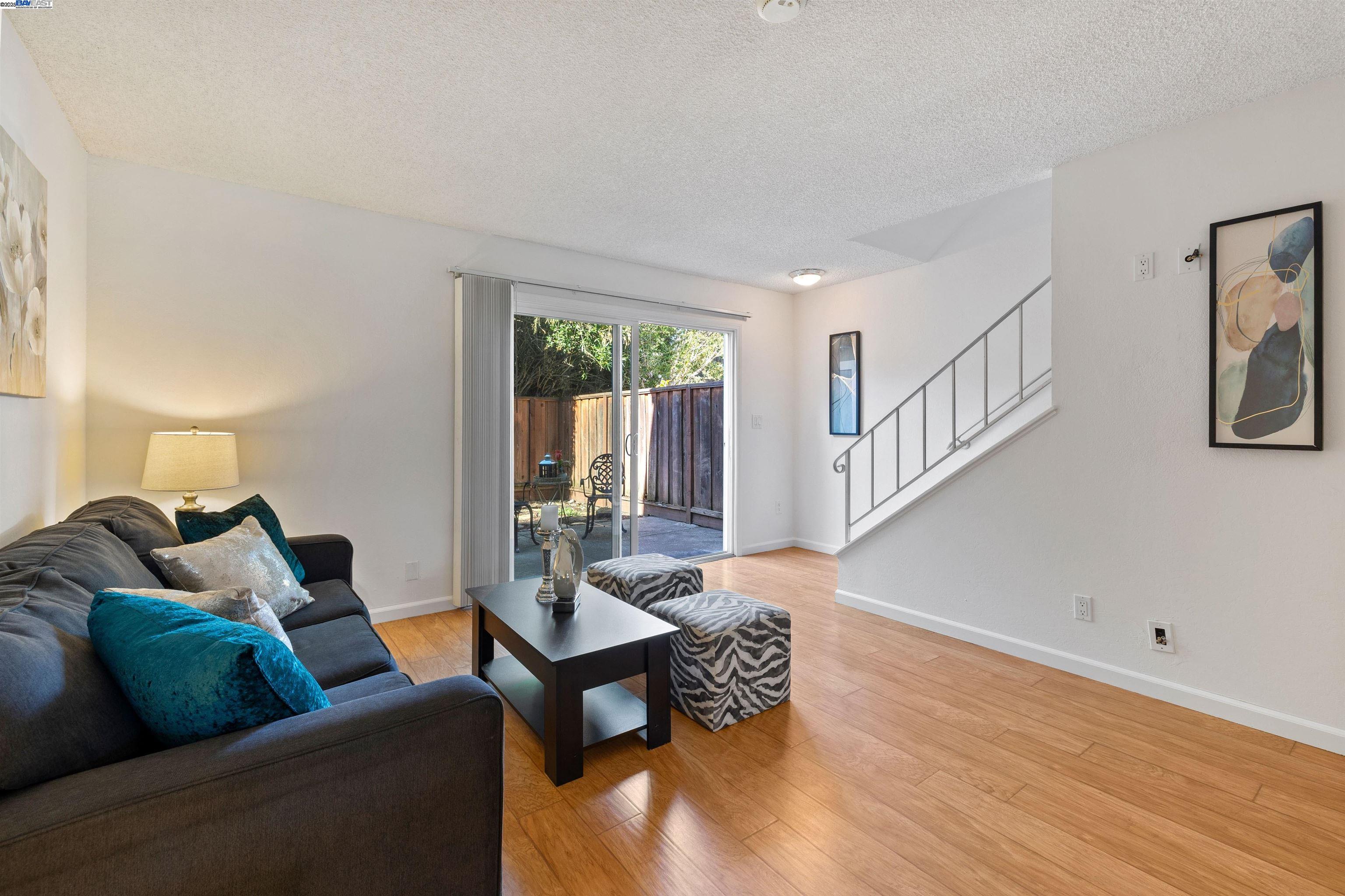 21053 Baker Road Castro Valley, CA 94546 - Photo 5 of 22 a living room with furniture and a window