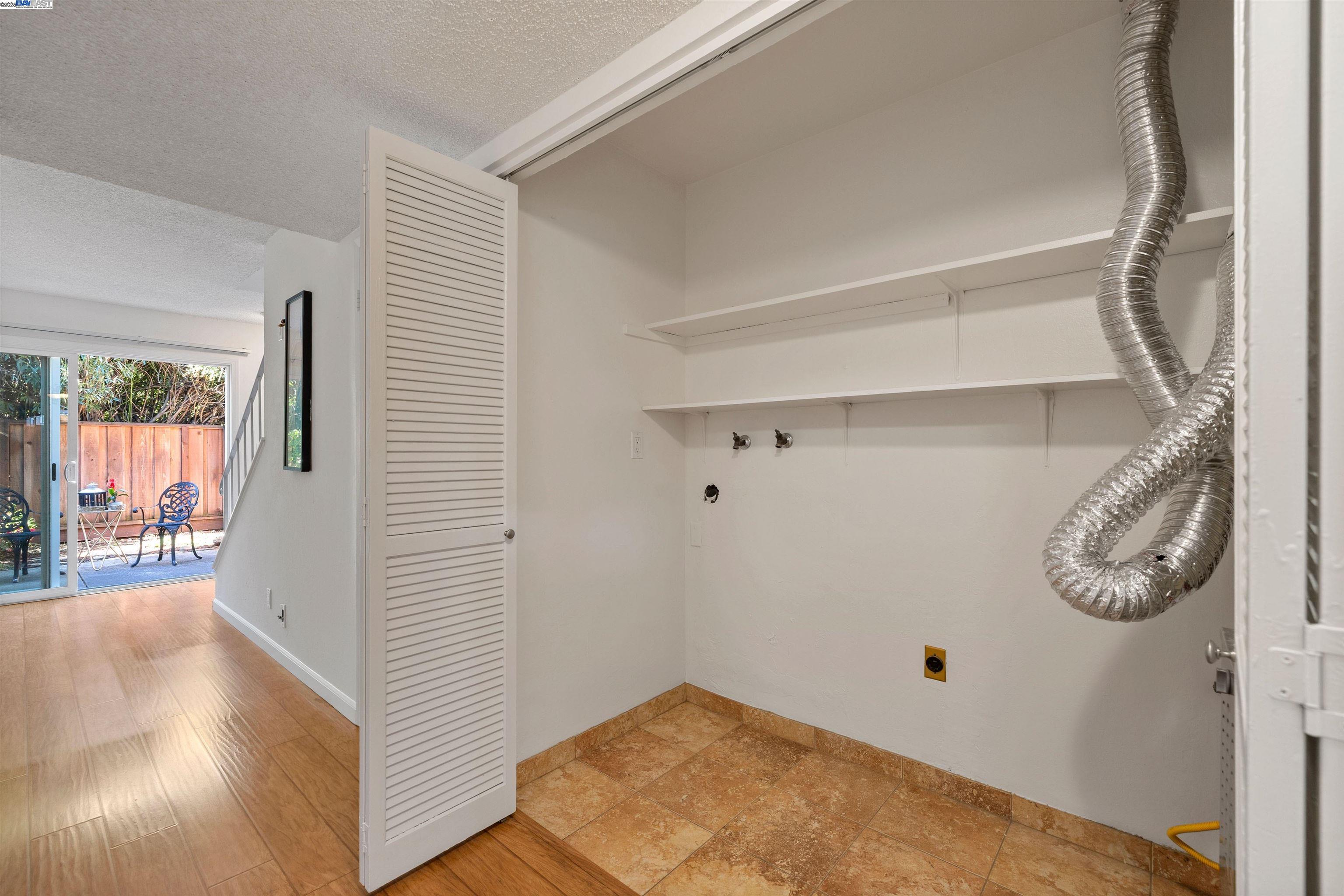 21053 Baker Road Castro Valley, CA 94546 - Photo 9 of 22 a view of a big room with wooden floor