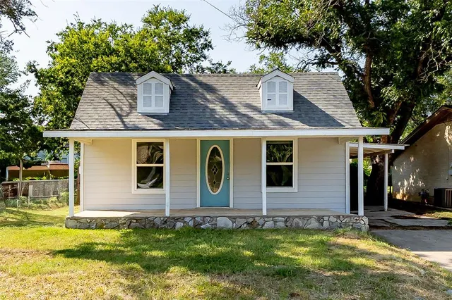 a view of a house with a swimming pool