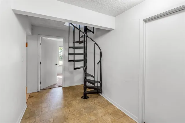 a view of an entryway with staircase