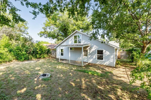 a front view of a house with yard