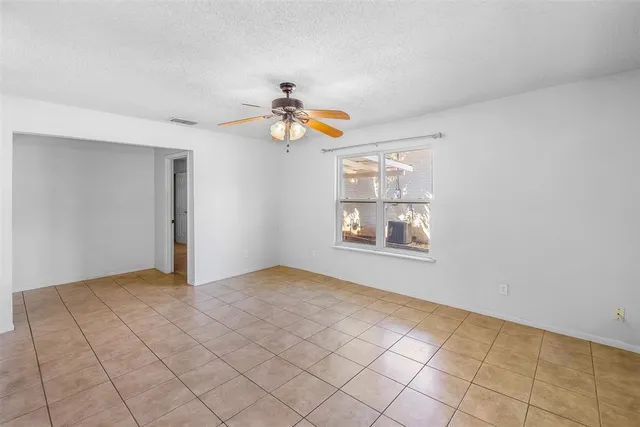 a view of an empty room with window