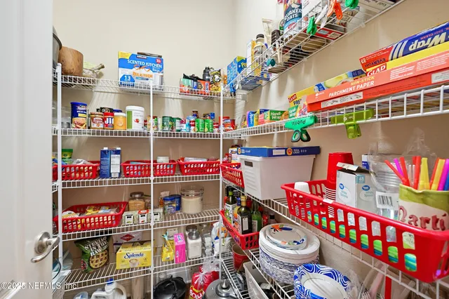 a kitchen with a sink appliances and a counter top space