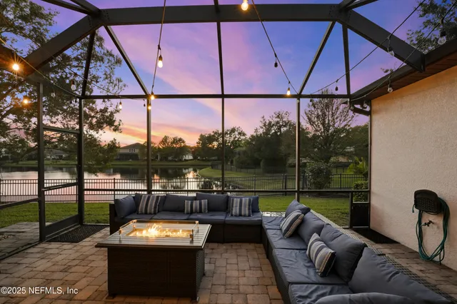 a view of a patio with couches chairs and a table