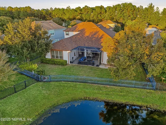a view of a house with a big yard