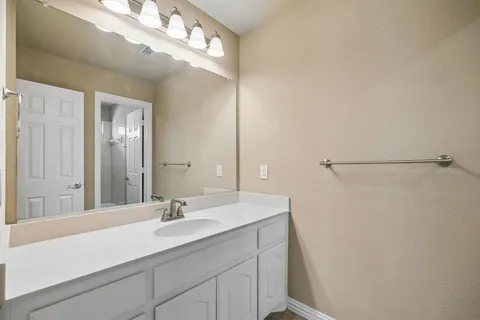 a bathroom with a bathtub and a toilet