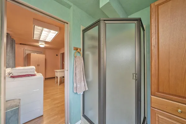 a bathroom with a toilet a sink and vanity