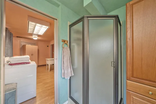 a bathroom with a toilet a sink and vanity
