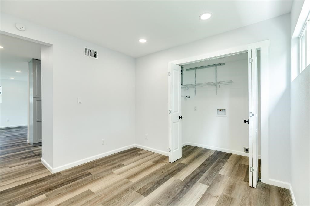846 South Anderson Street Angleton, TX 77515 - Photo 11 of 29 a view of a room with wooden floor