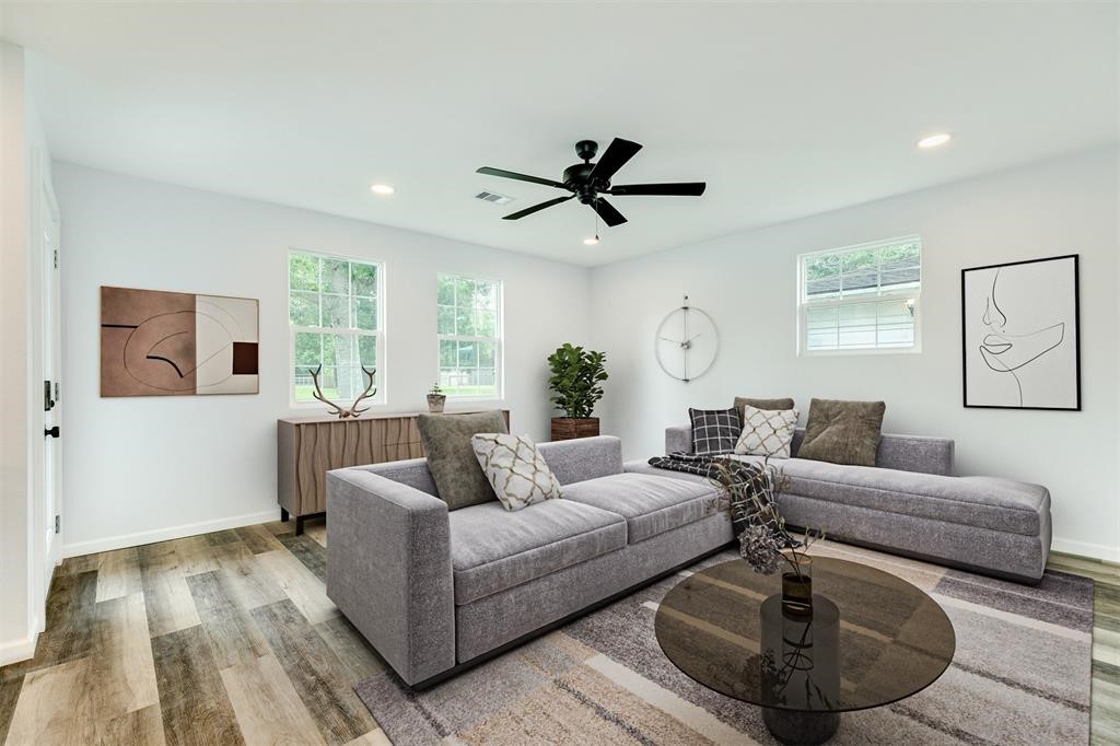 846 South Anderson Street Angleton, TX 77515 - Photo 5 of 29 a living room with furniture and a large window