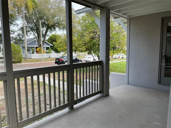 a front view of a house with a porch