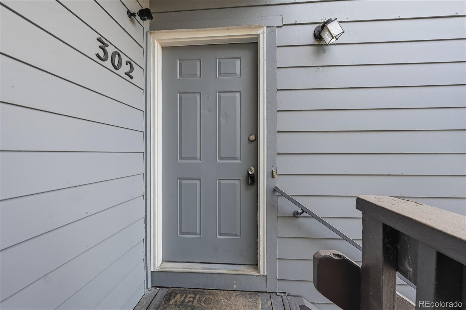 7883 Allison Way, Unit 302 Arvada, CO 80005 - Photo 4 of 29 a view of front door