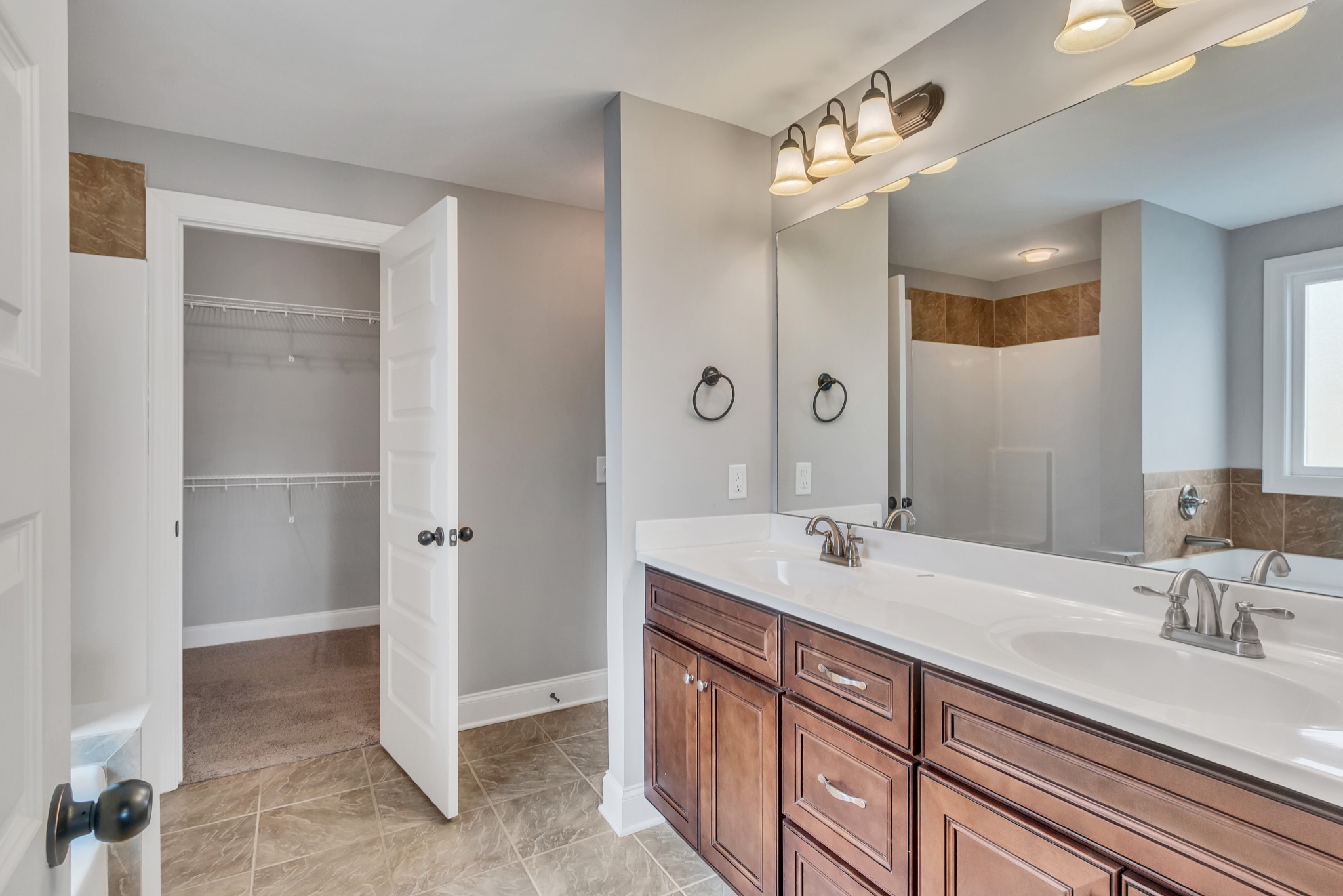 313 Drema Court Murfreesboro, TN 37127 - Photo 20 of 39 a bathroom with a sink double vanity and a mirror