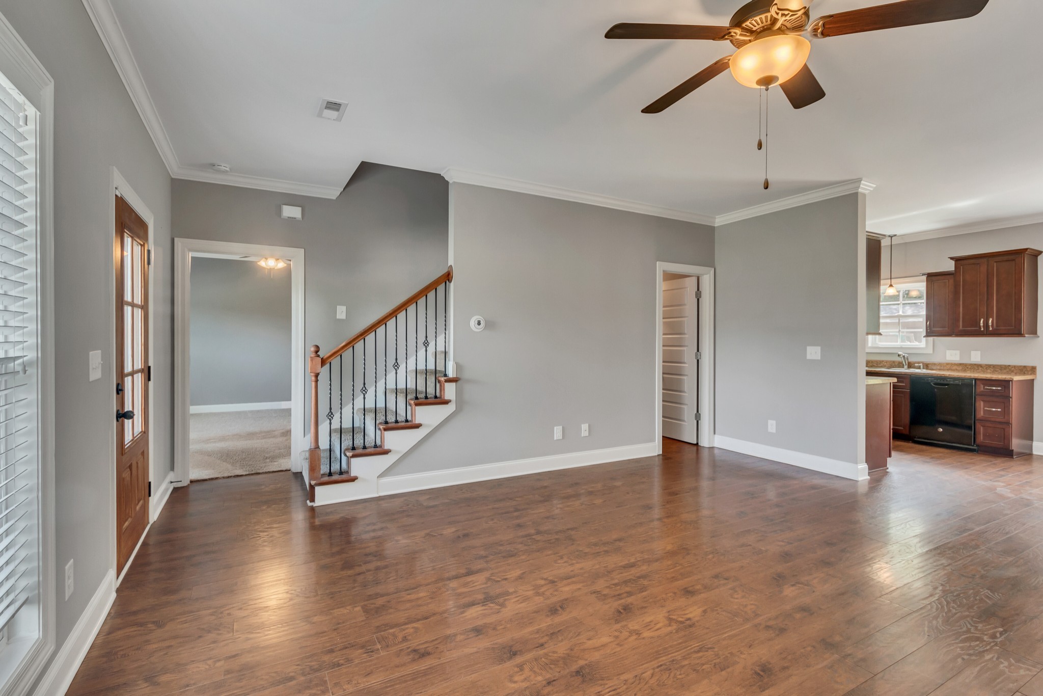 313 Drema Court Murfreesboro, TN 37127 - Photo 10 of 39 a view of a hallway with wooden floor and staircase