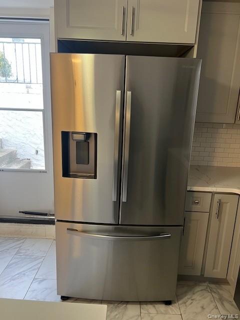 433 Palmer Road, Unit G Yonkers, NY 10701 - Photo 7 of 23 a white refrigerator freezer sitting in a kitchen