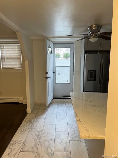 433 Palmer Road, Unit G Yonkers, NY 10701 - Photo 10 of 23 a view of a room with a fireplace cabinet and windows
