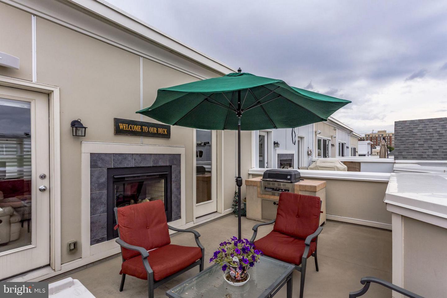 419 K Street Southeast Washington, DC 20003 - Photo 23 of 27 DOUBLE SIDED FIREPLACE FOR THOSE COOLER NIGHTS