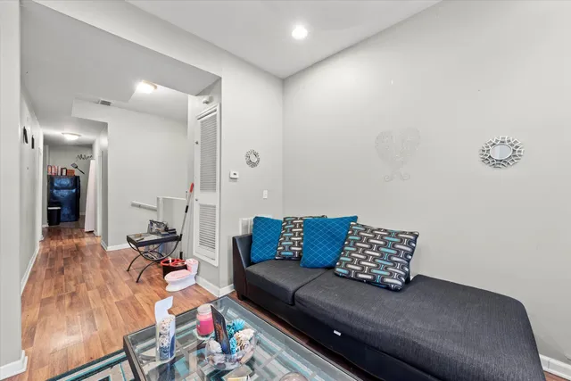 a living room with furniture and a couch