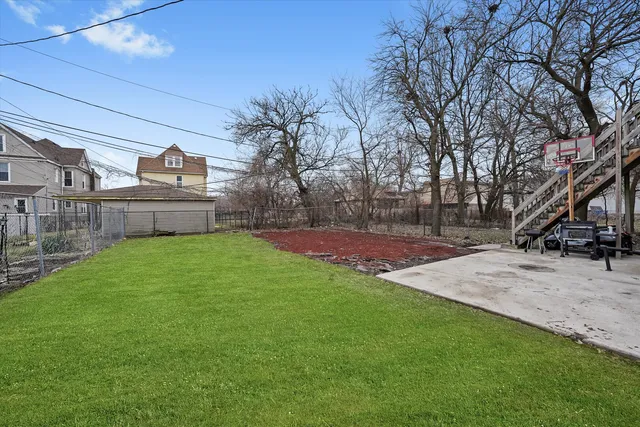 a view of a backyard with a garden