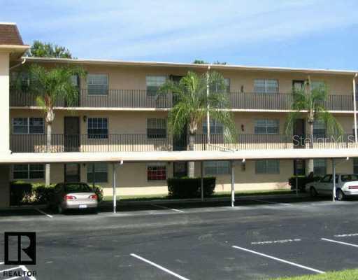 1370 Heather Ridge Boulevard, Unit 203 Dunedin, FL 34698 - Photo 1 of 1 Exterior Front