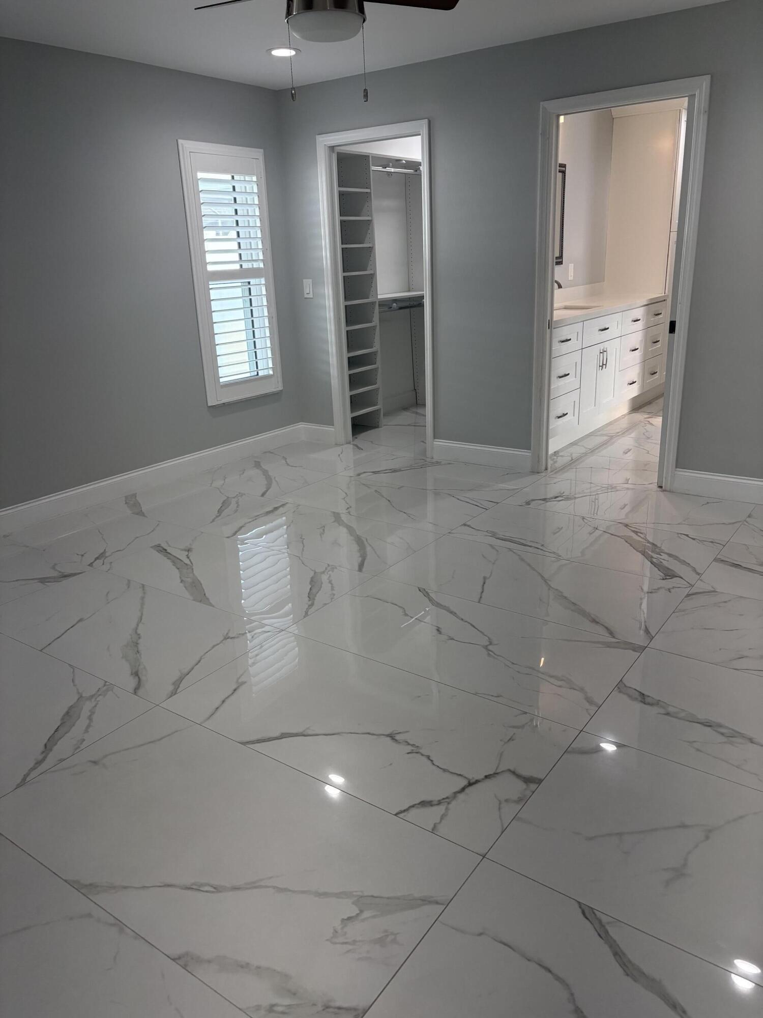 18255 181st Circle South Boca Raton, FL 33498 - Photo 5 of 16 a view of an empty room and window